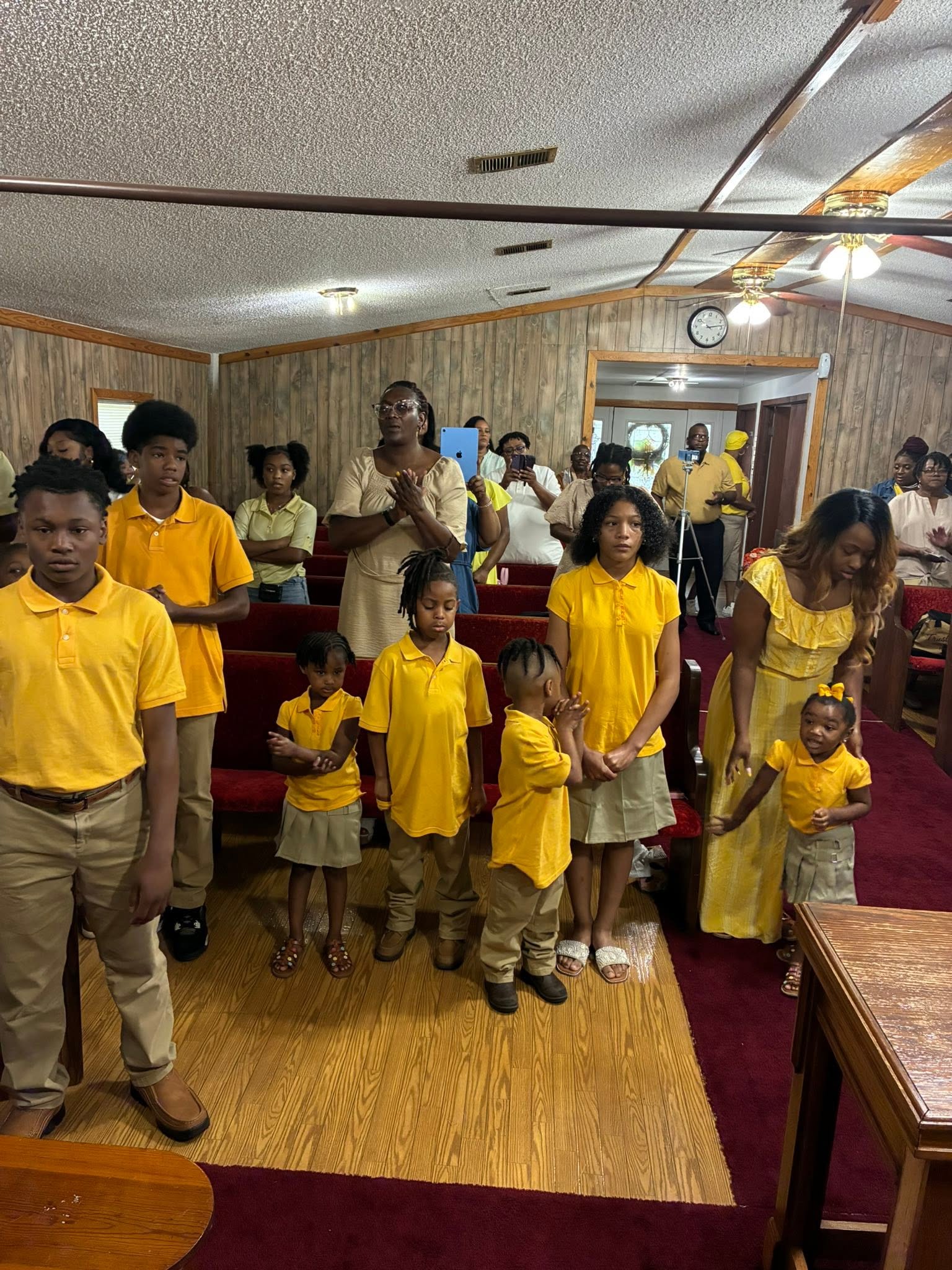 Youth and families participating in a church gathering